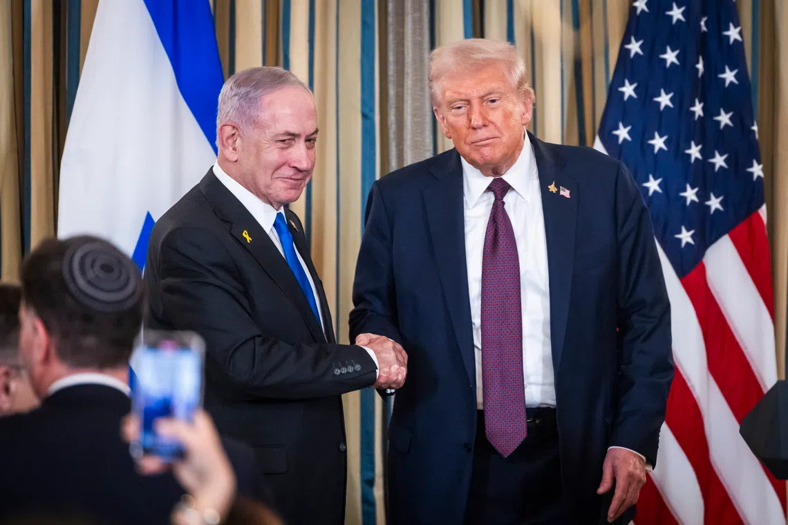 Israeli Prime Minister Benjamin Netanyahu (left) and US President Donald Trump holding a joint press conference at the White House on Sept 29.