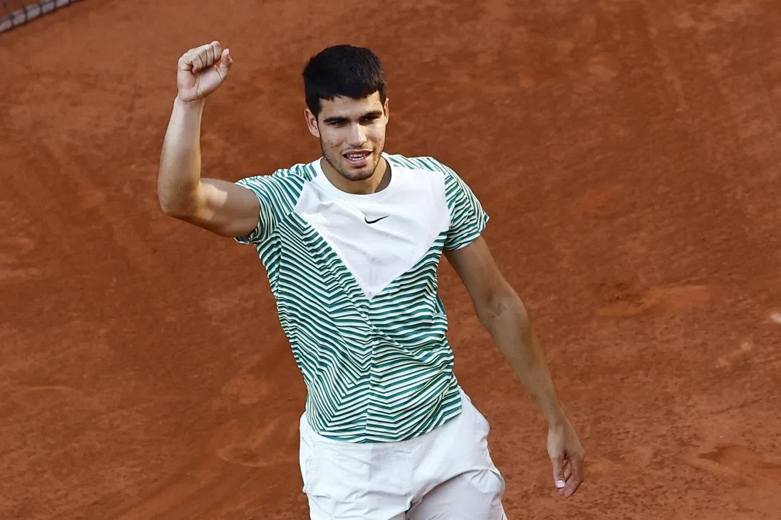 Spain's Carlos Alcaraz celebrates winning his fourth round match against Italy's Lorenzo Musetti.