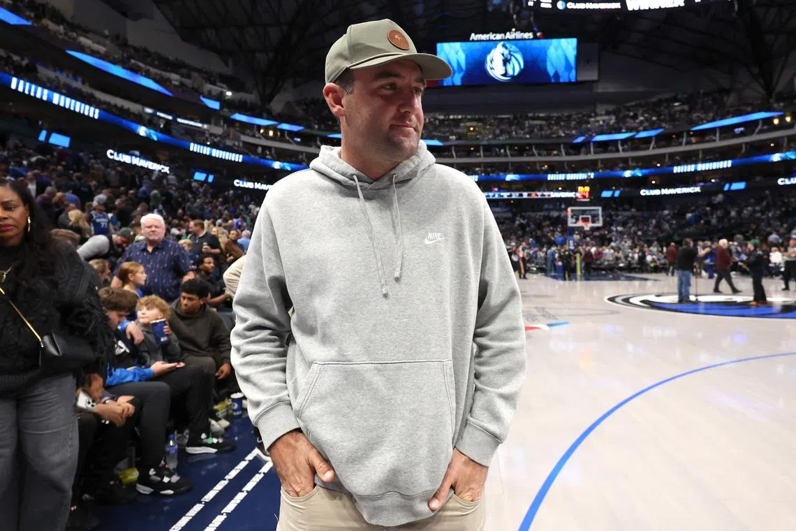 American golfer Scottie Scheffler attending an NBA game between the Dallas Mavericks and the Phoenix Suns during his downtime.