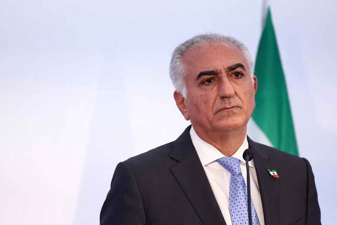 FILE PHOTO: Reza Pahlavi, the exiled son of the last Shah of Iran, attends a press conference about the situation in Iran and the need to support Iranians, in Paris, France, June 23, 2025. REUTERS/Abdul Saboor/File Photo