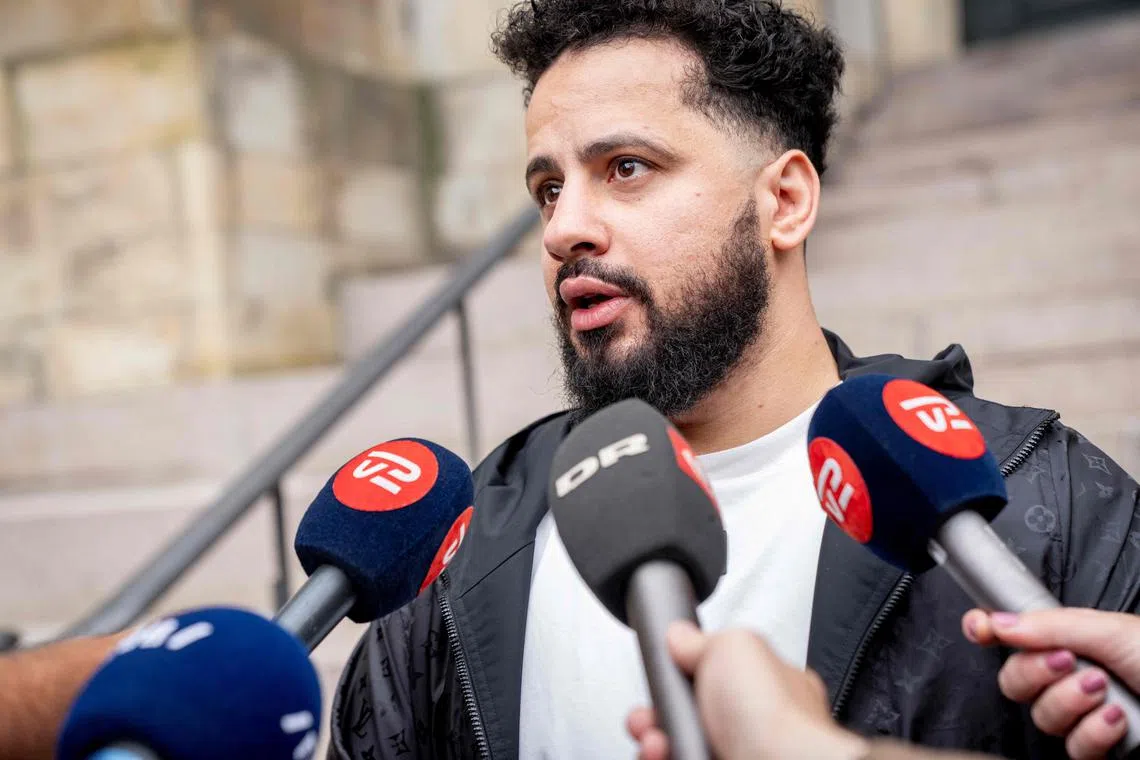Ahmed Samsam, a Danish citizen of Syrian origin who claims time he spent with the Islamic State (IS) group was as an agent for Danish intelligence, gives a statement in front of the press after the verdict in his case against the intelligence service at Denmark's Supreme Court in Copenhagen on September 2, 2025. Denmark's Supreme Court on September 2 ordered the country's intelligence services to admit that the Danish man of Syrian origin was their informant, which they immediately did. (Photo by Ida Marie Odgaard / Ritzau Scanpix / AFP) / Denmark OUT