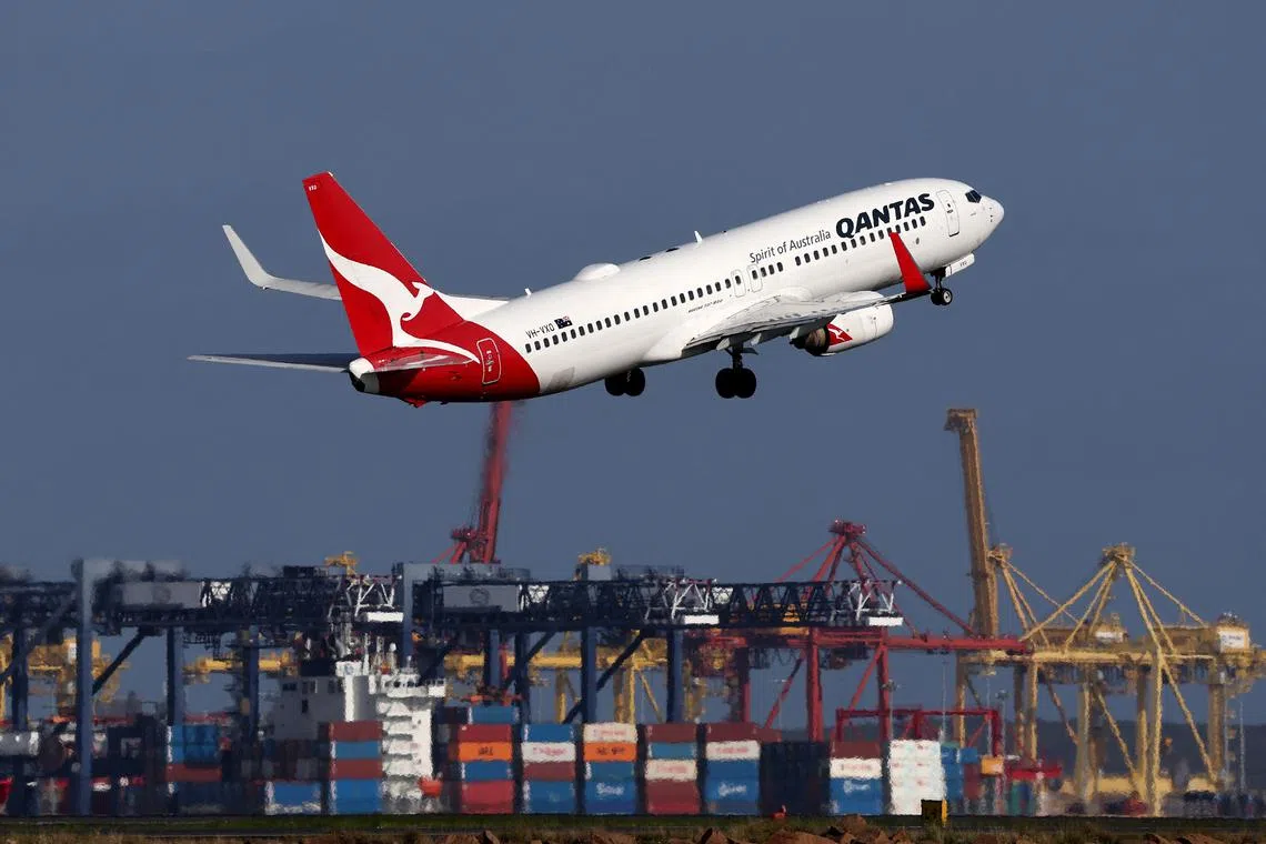 Qantas said lower fares had around a A$600 million impact on profit.