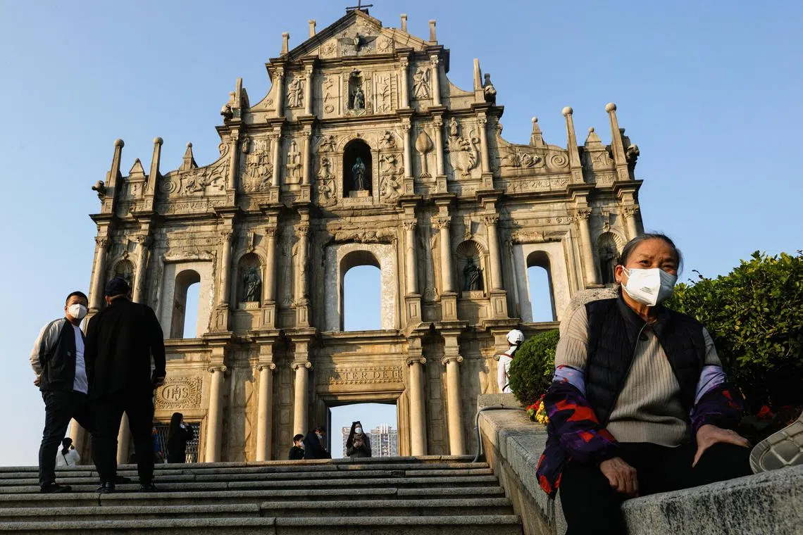 People visit the ruins of Saint Paul's in Macau, on Dec 29, 2022.