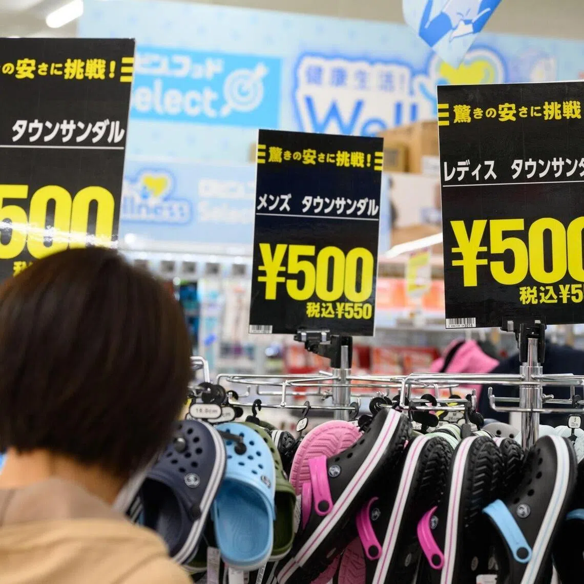 Price spikes have hit products reliant on rubber, plastic and oil-derived chemicals such as these footwear being sold at a store in Aichi prefecture, Japan.
