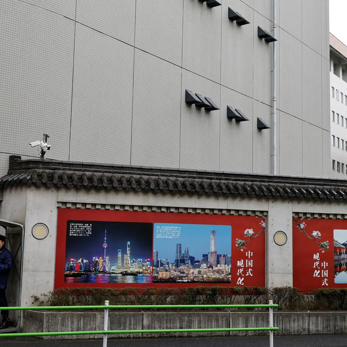 A Japanese police officer stands guard in front of the Chinese Embassy in Tokyo, Japan, March 25, 2026. REUTERS/Kim Kyung-Hoon