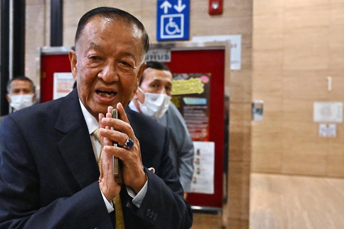 Pracharat Party leader and house speaker candidate Wan Mohamad Noor Matha gestures as he arrives prior to the house speaker vote at the Parliament in Bangkok on July 4, 2023. (Photo by Lillian SUWANRUMPHA / AFP)