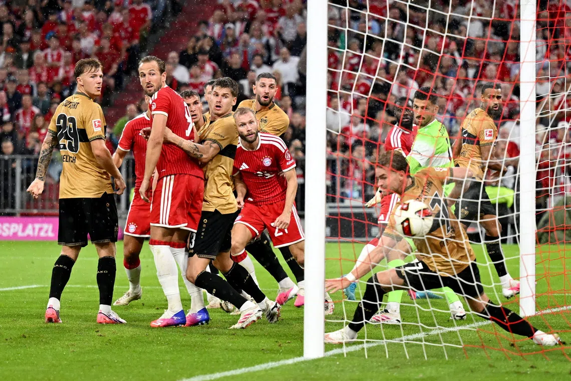 Soccer Football - Bundesliga - Bayern Munich v VfB Stuttgart - Allianz Arena, Munich, Germany - August 28, 2026  Bayern Munich's Dayot Upamecano scores their first goal REUTERS/Angelika Warmuth