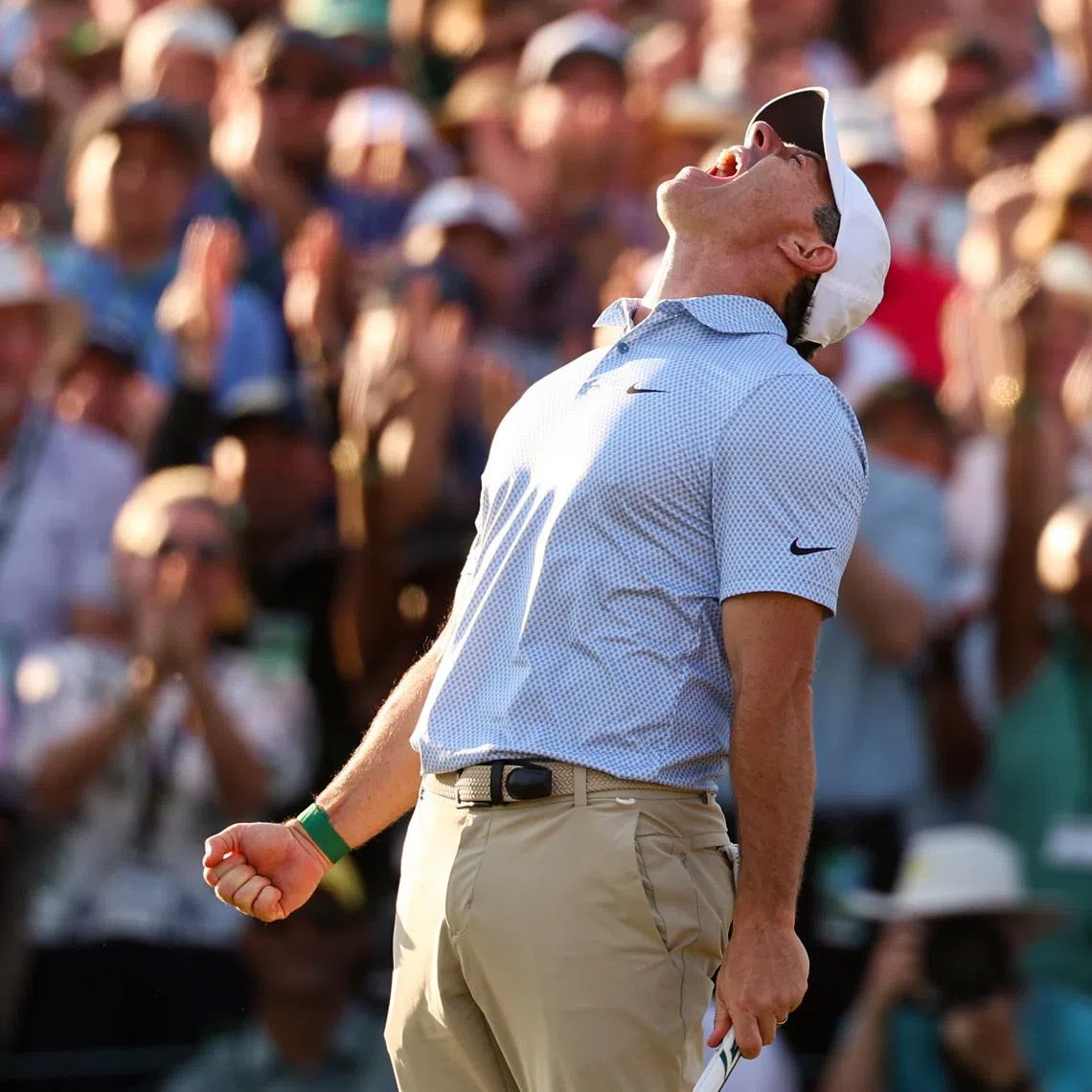 Apr 12, 2026; Augusta, Georgia, USA; Rory McIlroy reacts after making a putt to win the 2026 Masters Tournament at Augusta National Golf Club. Mandatory Credit: Bill Streicher-Imagn Images
