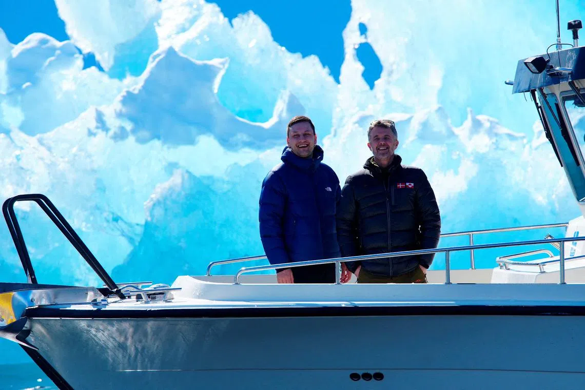 FILE PHOTO: Denmark's King Frederik and Greenlands head of government Jens-Frederik Nielsen in front of a iceberg during a boat trip in Nuuk fjord, in Greenland, April 29, 2025  Ritzau Scanpix/Ida Marie Odgaard via REUTERS/File Photo