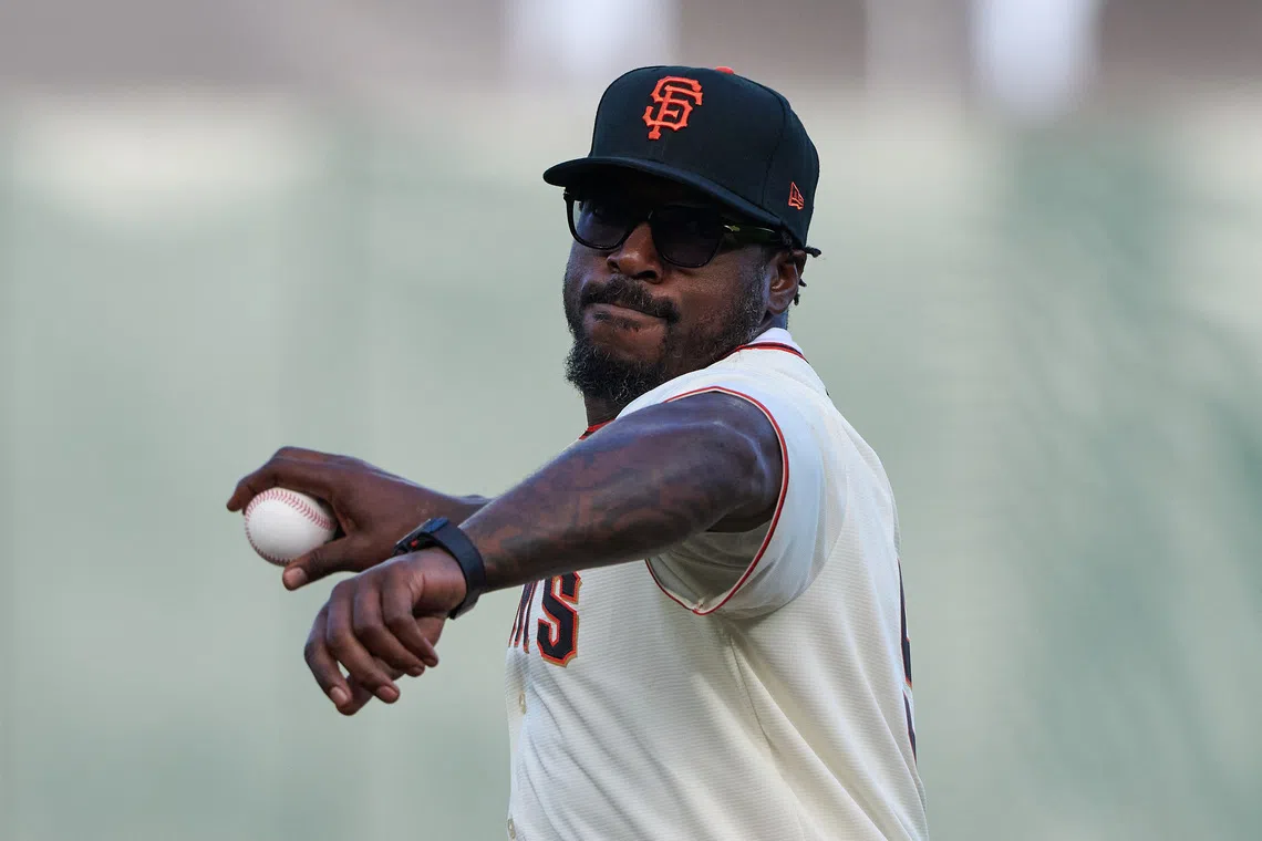 Sep 14, 2024; San Francisco, California, USA;  2024 Pro Football Hall of Fame inductee and former San Francisco 49ers linebacker Patrick Willis throws out the ceremonial first pitch before the game between the San Francisco Giants and the San Diego Padres at Oracle Park. Mandatory Credit: Robert Edwards-Imagn Images
