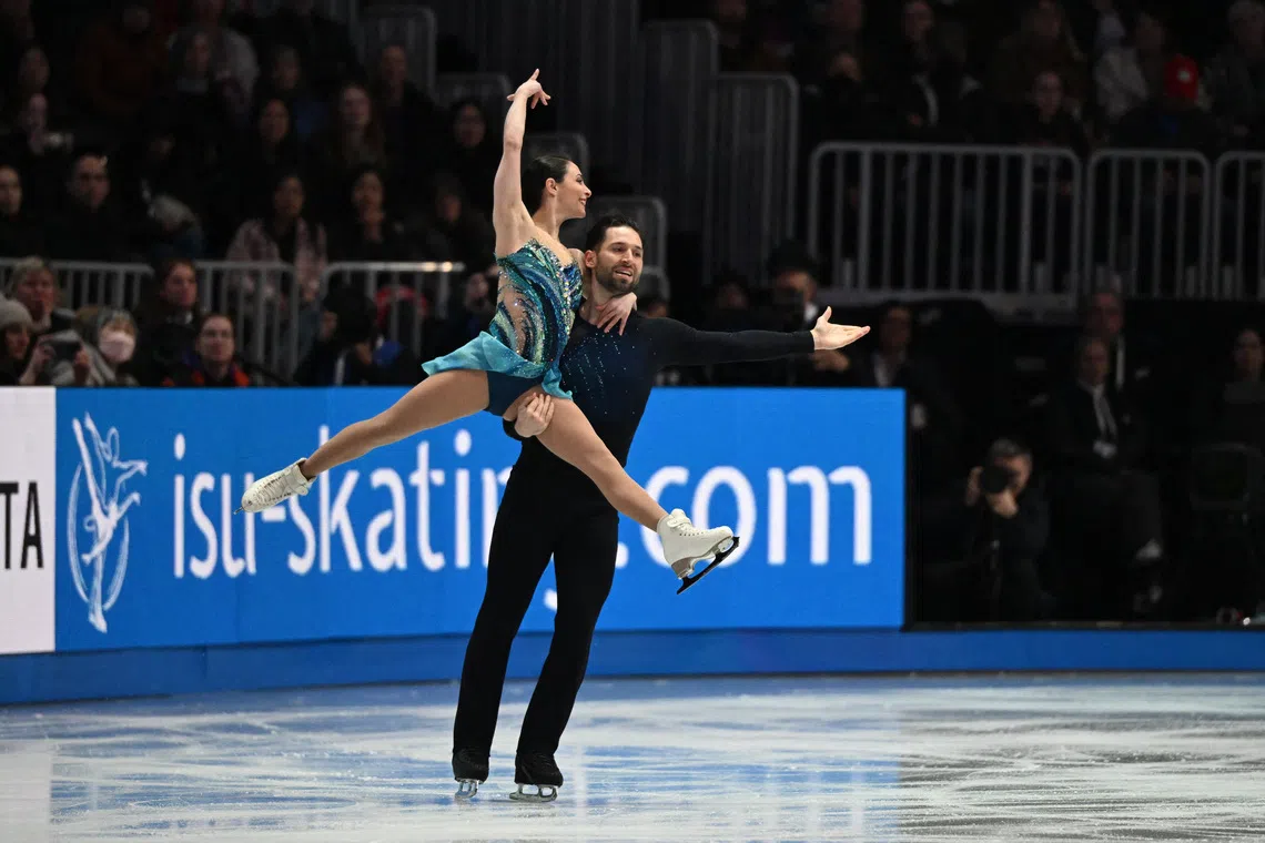 Mar 27, 2025; Boston, Massachusetts, USA; Deanna Stellato-Dudek (CAN) and Maxime Deschamps (CAN) compete in the pairs free skating program during the ISU World Figure Skating Championships at TD Garden. Mandatory Credit: Brian Fluharty-Imagn Images