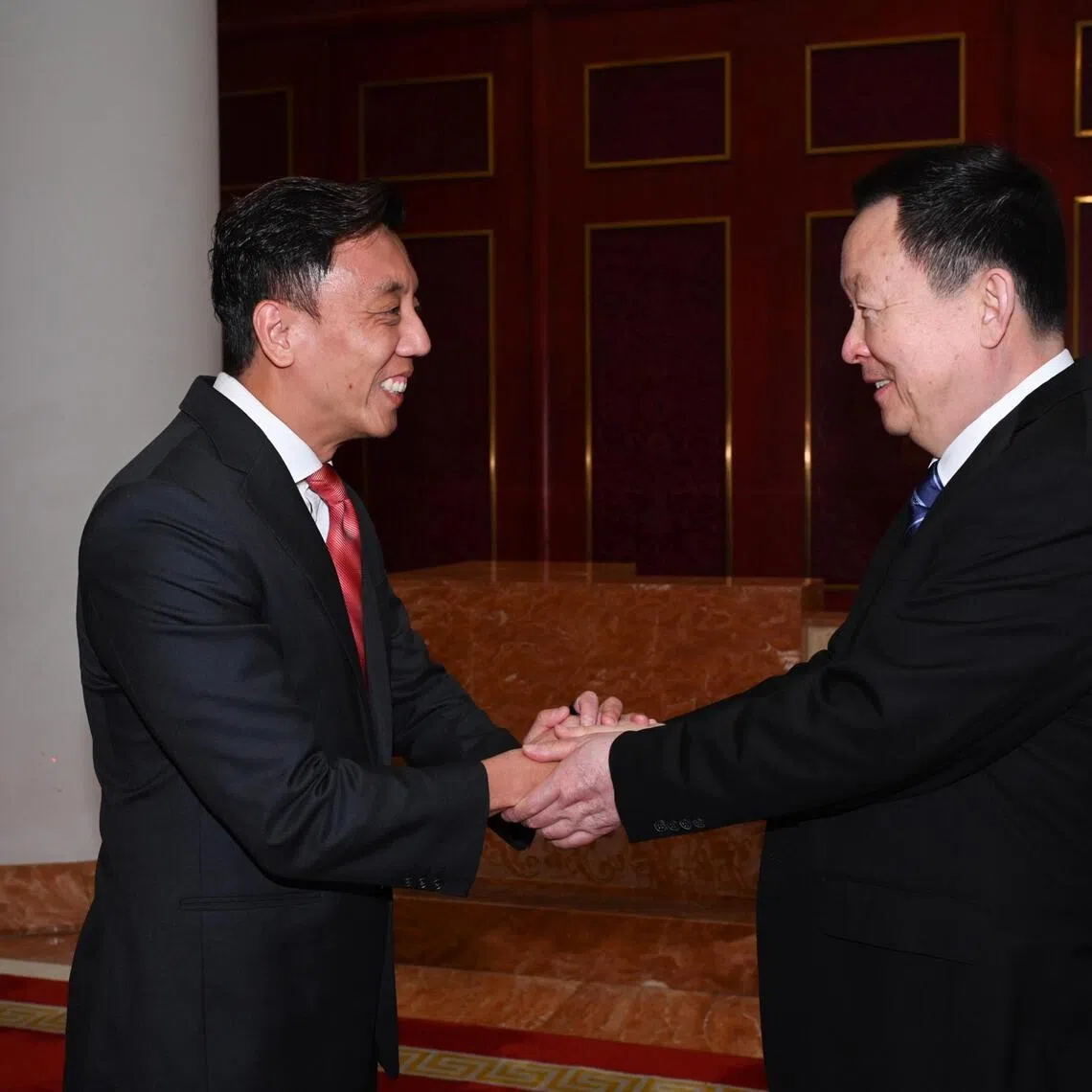 Acting Transport Minister Jeffrey Siow shaking hands with Shandong governer Zhou Naixiang at the Shandong Hotel in Jinan on March 31, 2026. Credit: Enterprise Singapore