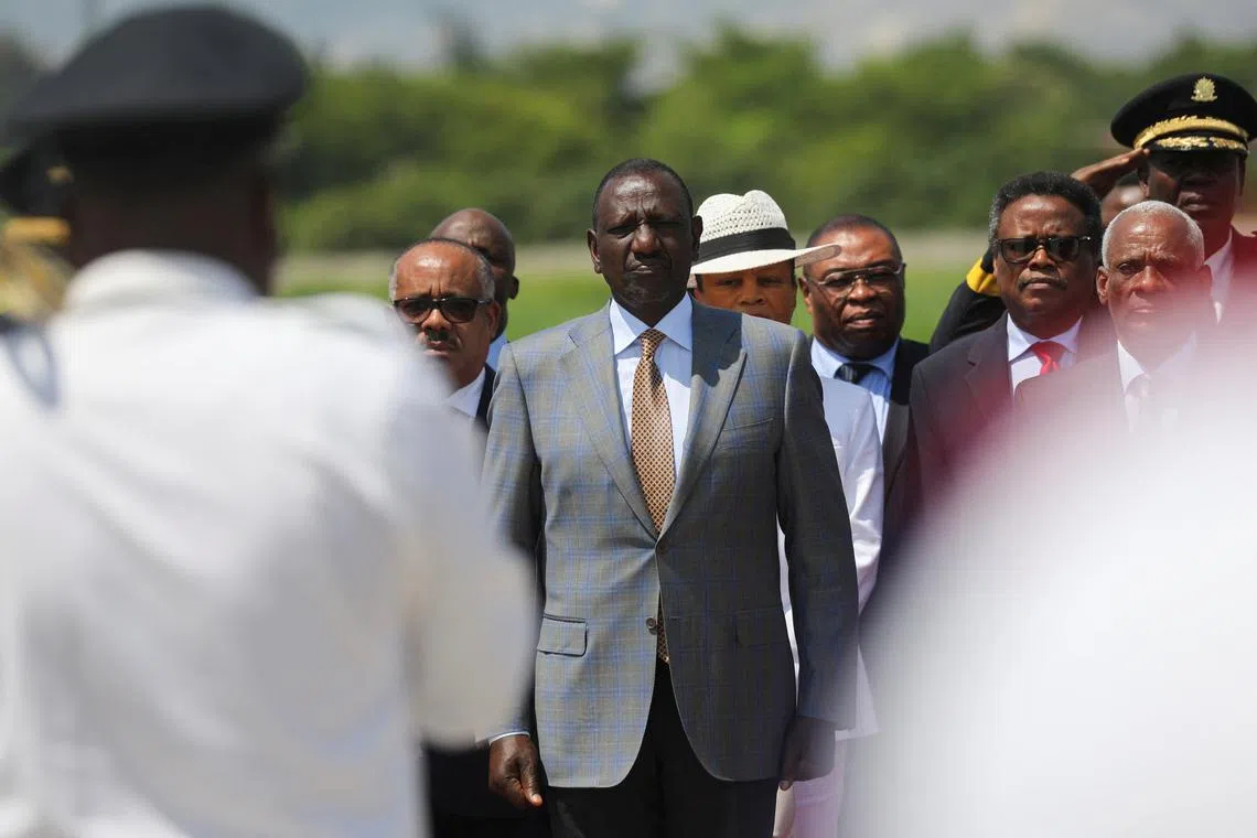 Kenyan President William Ruto arrives as he visits Haiti to review security assistance at the Toussaint Louverture International Airport, in Port-au-Prince, Haiti, September 21, 2024. REUTERS/Ralph Tedy Erol