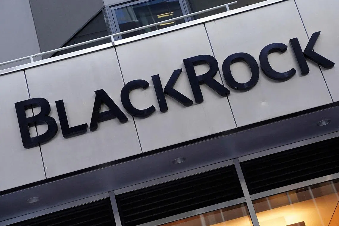 FILE PHOTO: The BlackRock logo is pictured outside its headquarters in the Manhattan borough of New York City, New York, U.S., May 25, 2021.  REUTERS/Carlo Allegri/File Photo