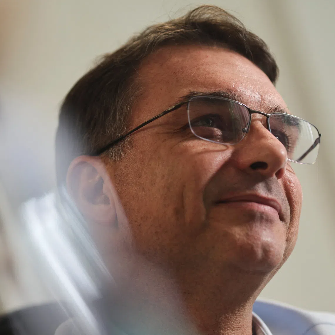 Senator Flavio Bolsonaro, son of Brazil's former President Jair Bolsonaro, attends an interview with Reuters in Brasilia, Brazil December 19, 2025. REUTERS/Adriano Machado