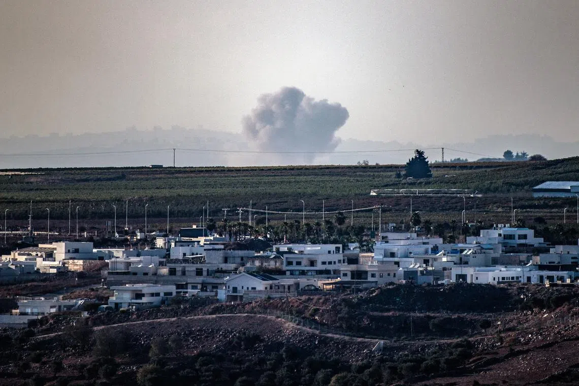 Smoke billows over southern Lebanon following Israeli strikes, amid ongoing cross-border hostilities between Hezbollah and Israeli forces, as seen from the Israeli side of Israel Lebanon border September 23, 2024 REUTERS/Gil Eliyahu