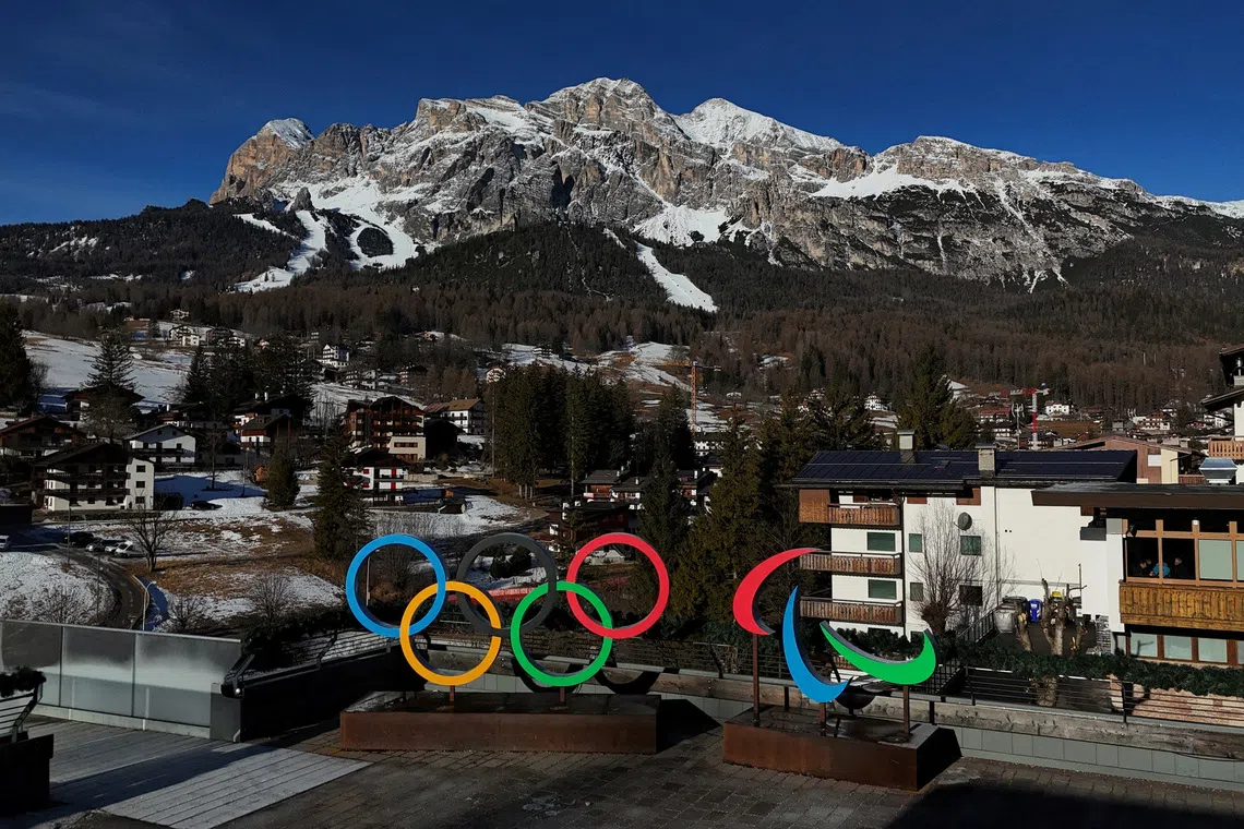 FILE PHOTO: An aerial view shows the Olympic rings and the Olympia delle Tofane track in Cortina, which will host the women's alpine skiing competition during the Milano Cortina Winter Olympic Games 2026, in Cortina, Italy, January 24, 2025. REUTERS/Claudia Greco/File Photo
