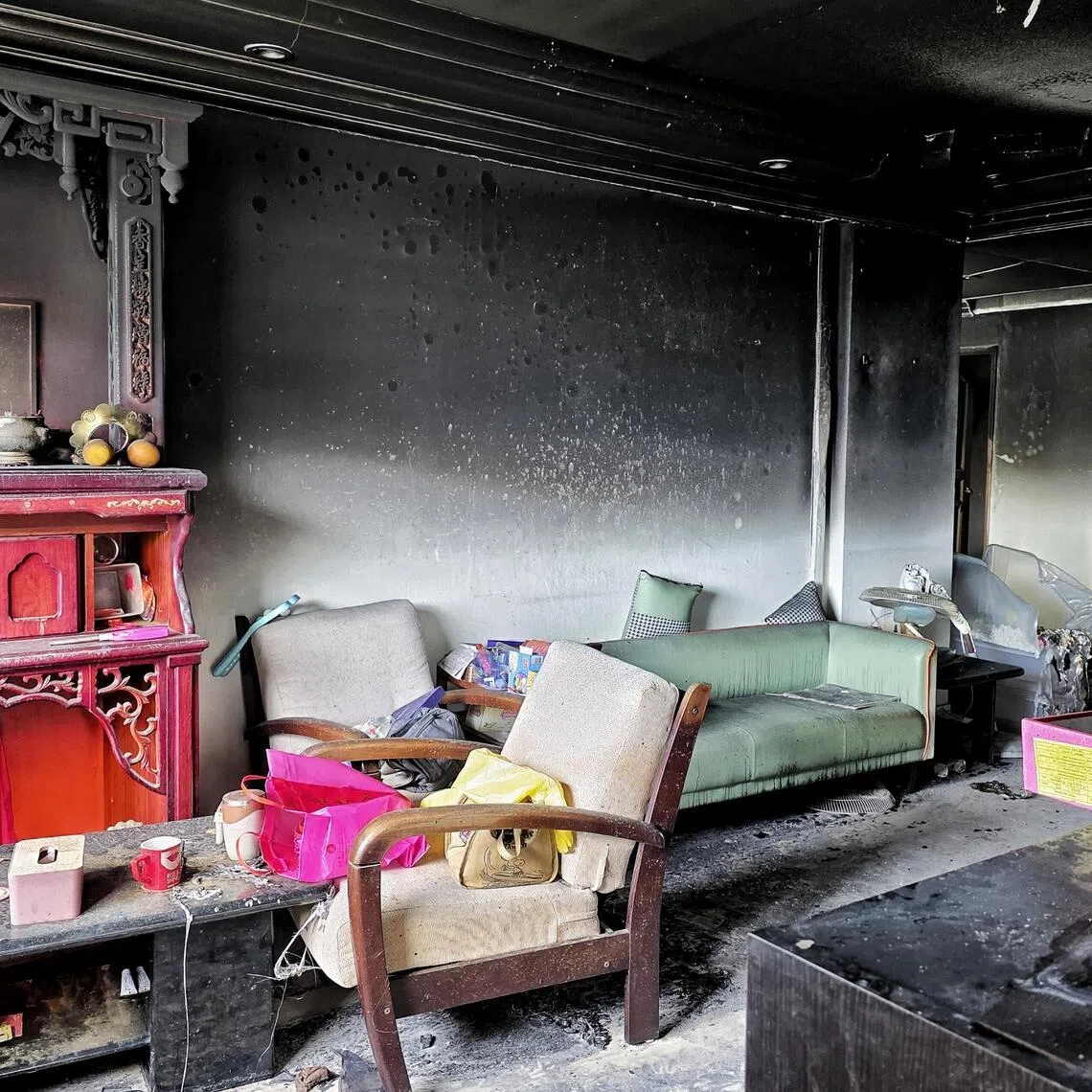 The fire, involving contents of a living room, was extinguished with one water jet.
