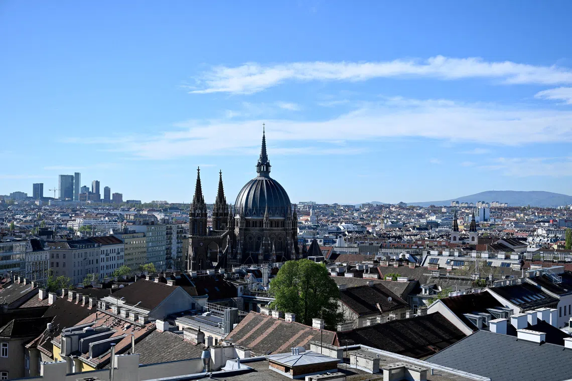 FILE PHOTO: A general view of the cityscape of Vienna with the Maria vom Siege church in front, Austria, April 16, 2025. REUTERS/Elisabeth Mandl/File Photo