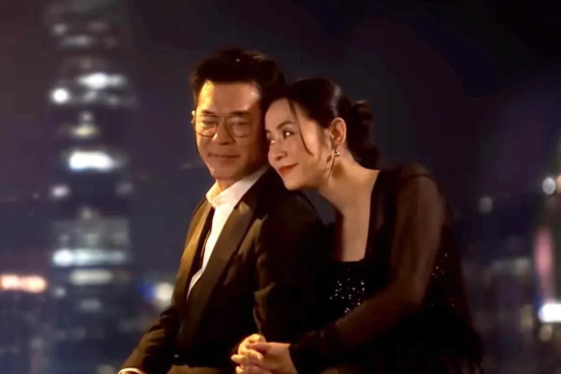Louis Koo and Jessica Hsuan in the music video for Beyond Time And Space.