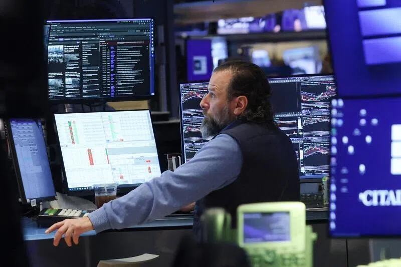 A trader works on the floor of the New York Stock Exchange at the opening bell on Feb 20, 2026.