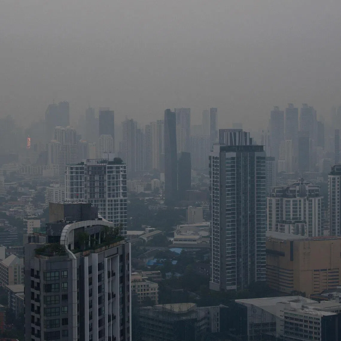 The city skyline is pictured amid high levels of air pollution in Bangkok in October 2023.