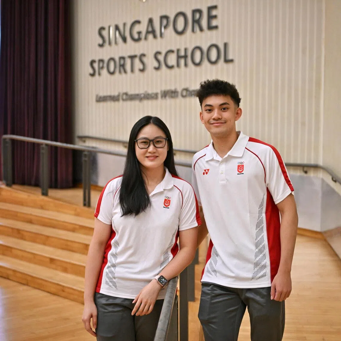 Bowler Colleen Pee (left) and fencer Azfar Ong at Singapore Sports School during the school's SEA Games send-off ceremony on Nov 12.