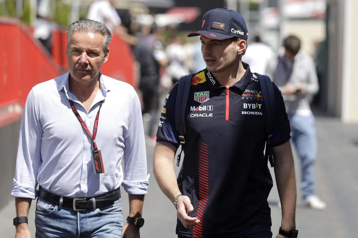 Red Bull's Max Verstappen and manager Raymond Vermeulen at the Baku City Circuit.