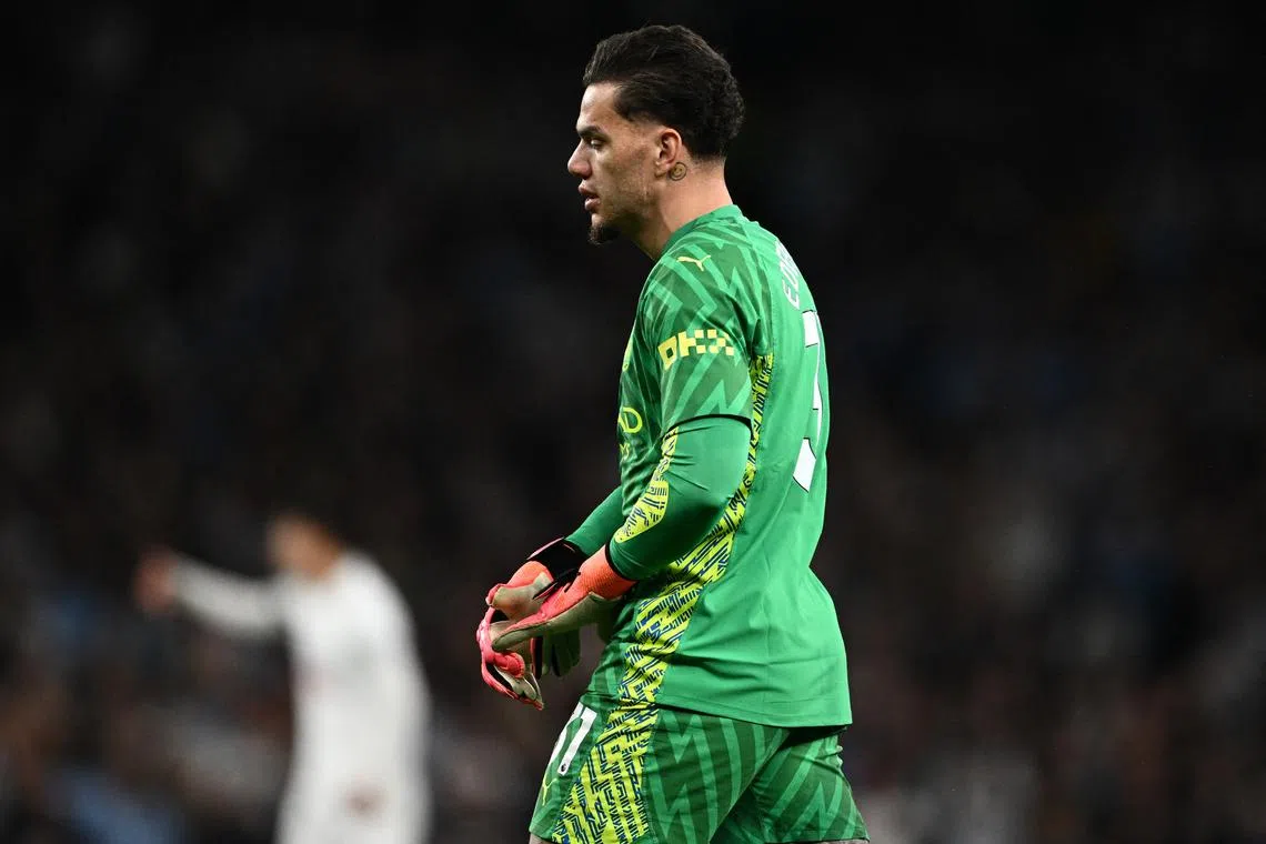 FILE PHOTO: Soccer Football - Premier League - Tottenham Hotspur v Manchester City - Tottenham Hotspur Stadium, London, Britain - May 14, 2024 Manchester City's Ederson walks off the pitch after sustaining an injury REUTERS/Dylan Martinez