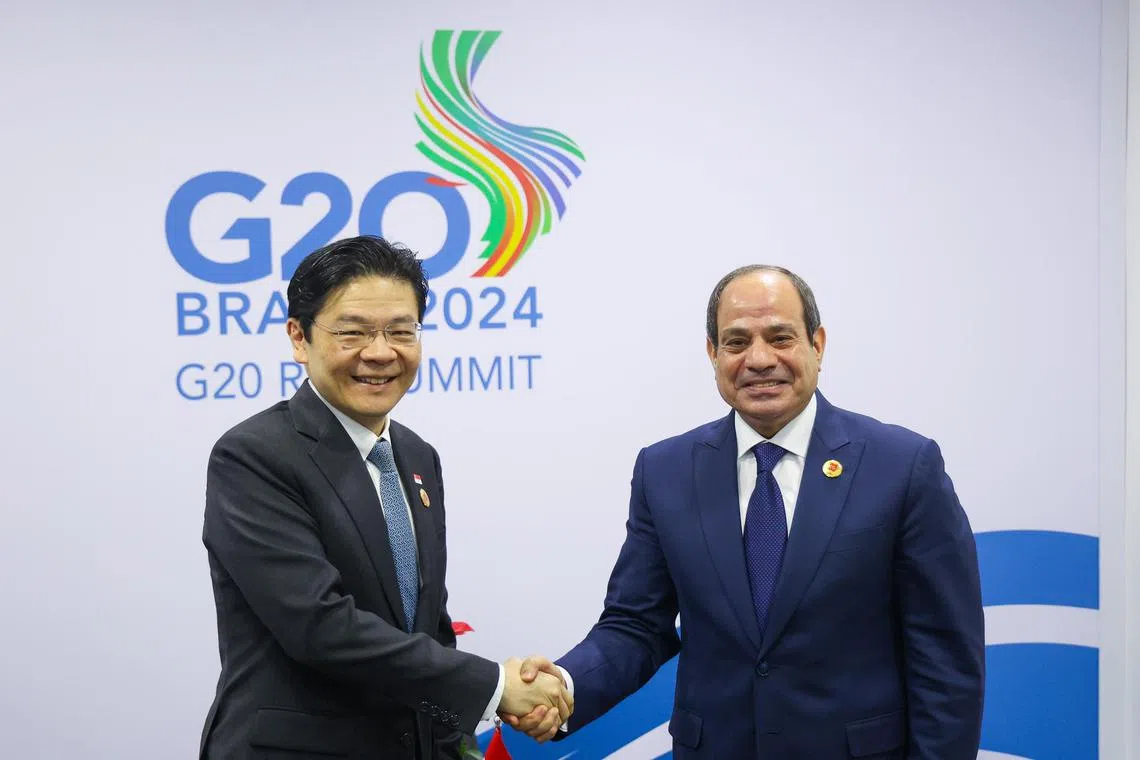 Prime Minister Lawrence Wong with Egyptian President Abdel Fattah al-Sisi at the Group of 20 summit on Nov 19.
