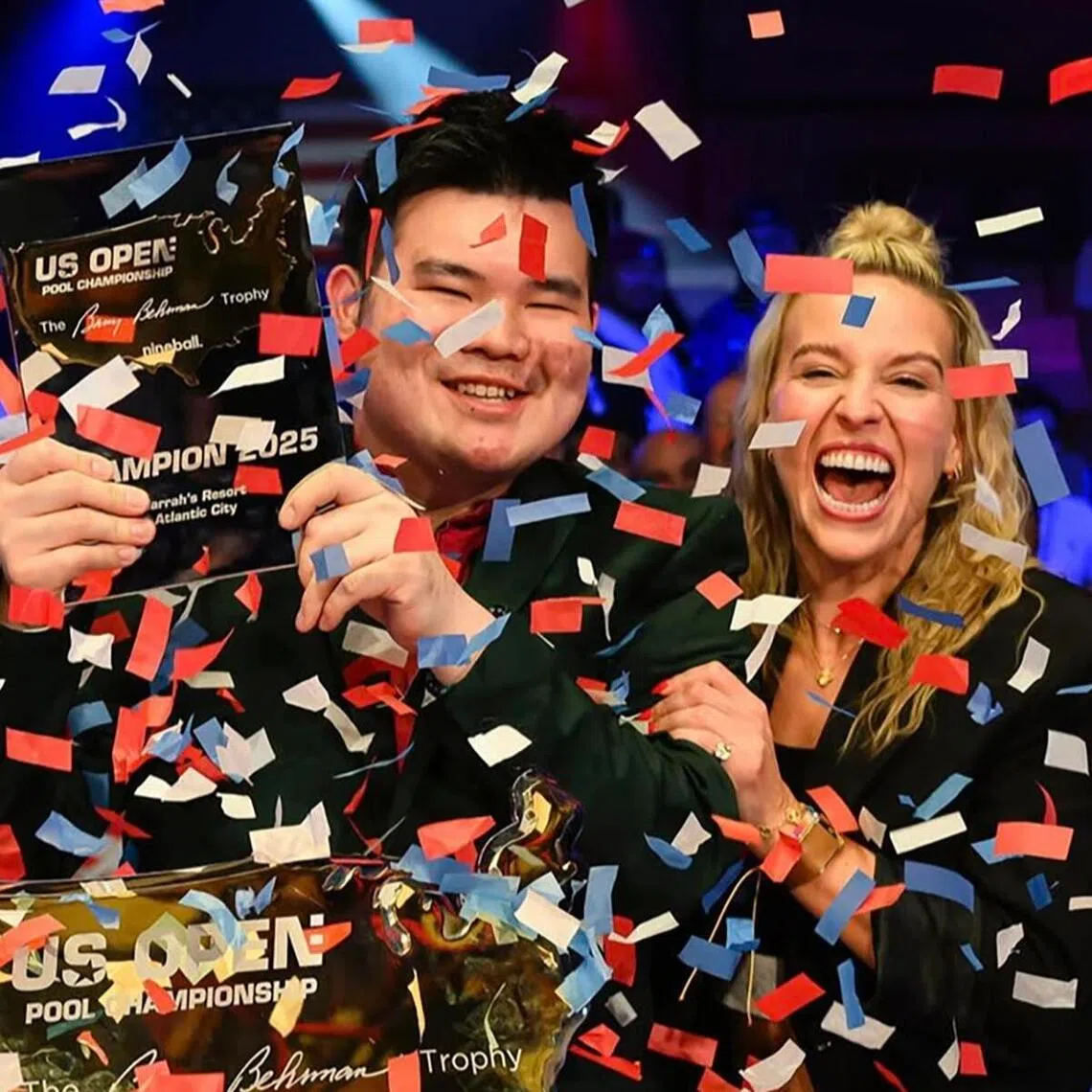 Singapore's Aloysius Yapp celebrates with Matchroom Multi Sport chief executive officer Emily Fraser after he captures his first US Open crown and becomes the first player to win three straight Matchroom major titles.