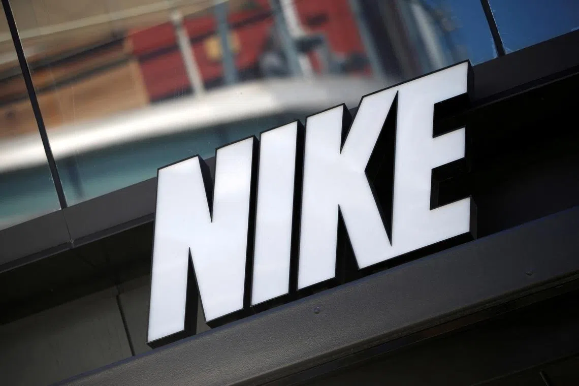 FILE PHOTO: The logo of Dow Jones Industrial Average stock market index listed company Nike (NKE) is seen in Los Angeles, California, United States, April 12, 2016. REUTERS/Lucy Nicholson/File Photo