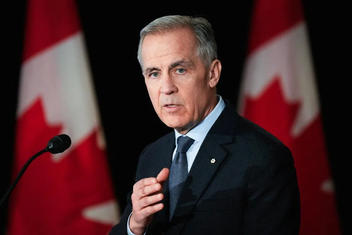 Canada's Prime Minister Mark Carney speaks during a news conference before a cabinet planning forum at the Citadelle in Quebec City, Quebec, Canada January 22, 2026. REUTERS/Mathieu Belanger