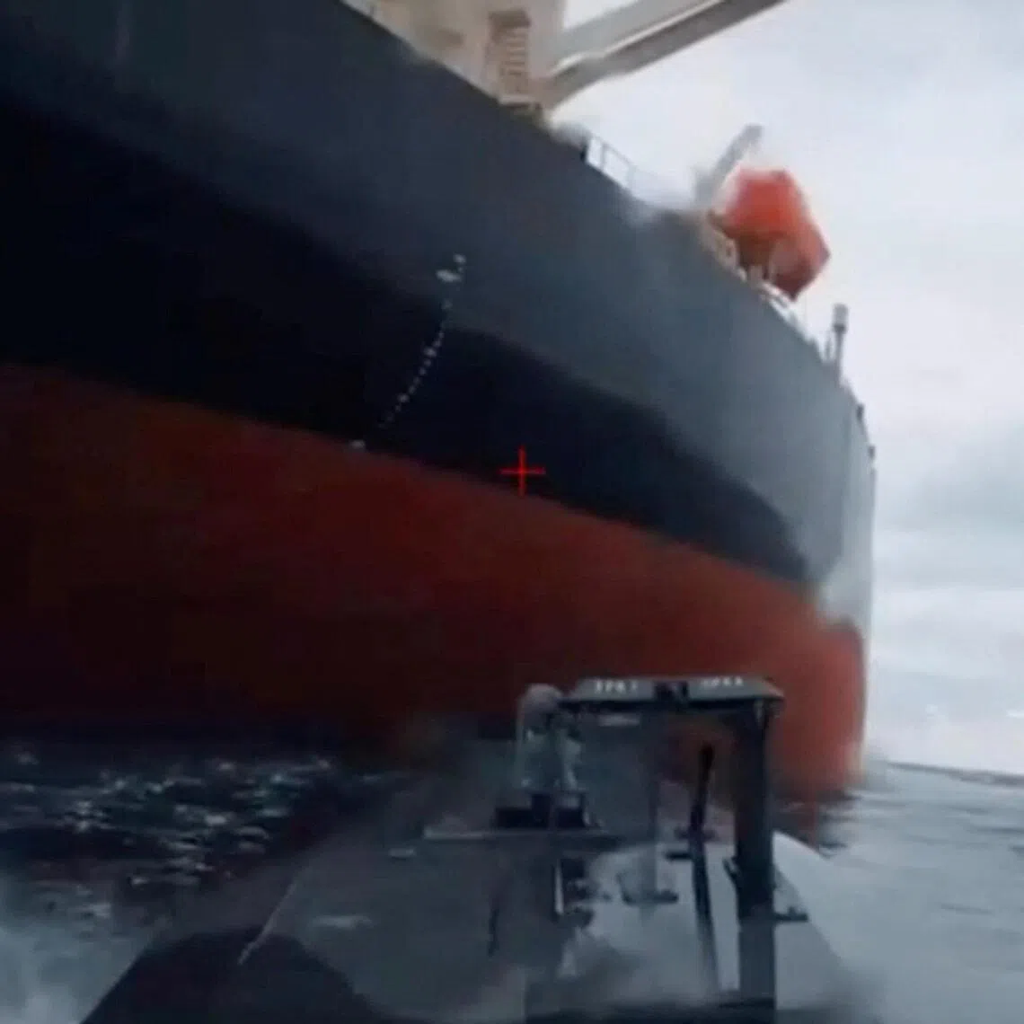 A Dec 10 image shows a Ukrainian sea drone approaching the Dashan - a tanker that is part of Russia's so-called "shadow fleet" - in the Black Sea. Ukraine has not commented on the latest Black Sea tanker attacks.