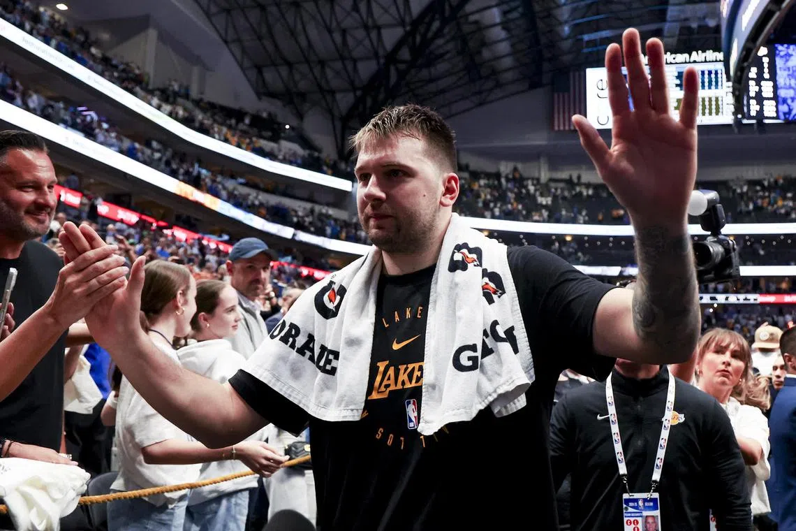  Los Angeles Lakers guard Luka Doncic waves to fans after the game against the Dallas Mavericks.