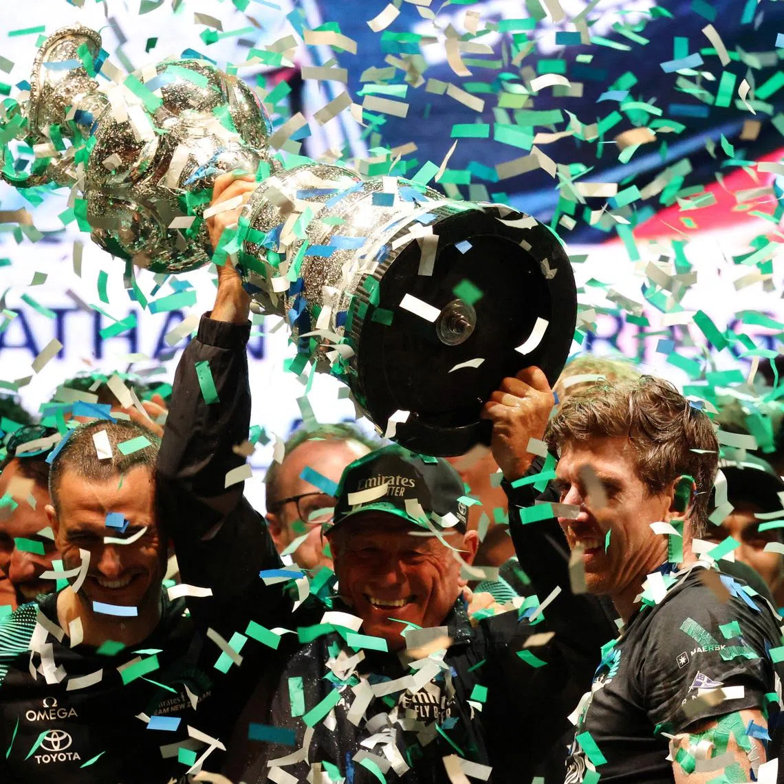 FILE PHOTO: Sailing - 37th America's Cup - New Zealand v Britain - Barcelona, Spain - October 19, 2024 CEO of Emirates Team New Zealand, Grant Dalton celebrates with teammates holding the Auld Mug trophy after winning the 37th America's Cup REUTERS/Nacho Doce/File Photo