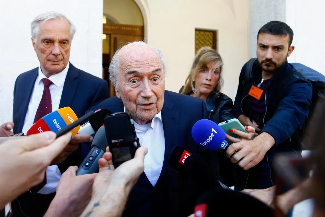 FILE PHOTO: Former FIFA president Sepp Blatter speaks to the media in front of the Swiss Federal Criminal Court in Bellinzona, Switzerland June 9, 2022. REUTERS/Arnd Wiegmann/File Photo