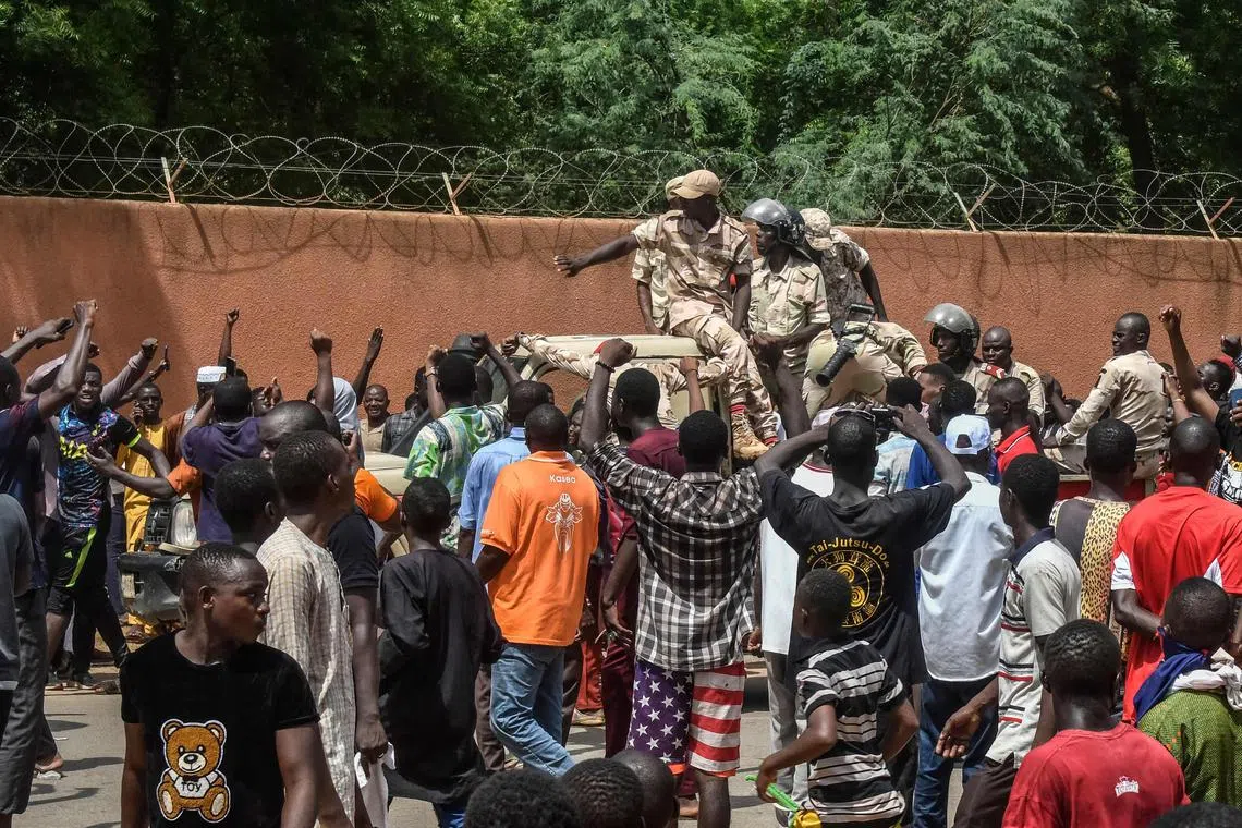 Thousands of pro-junta protesters demonstrated in front of the French embassy in Niamey on Sunday.