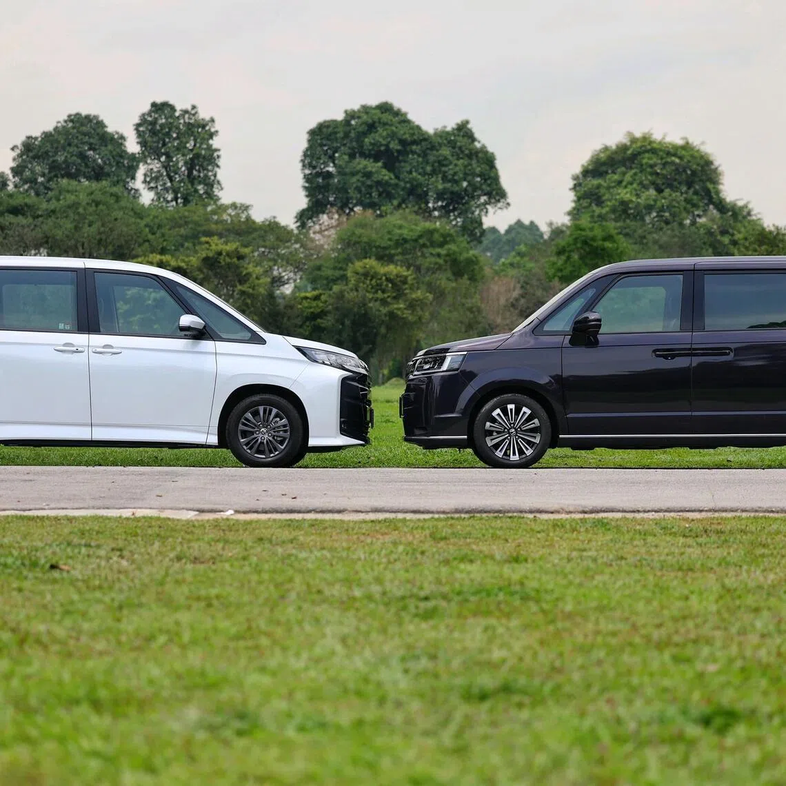 Outdoor shoot for Toyota Noah (left) vs Honda StepWGN (right) on March 3, 2026.