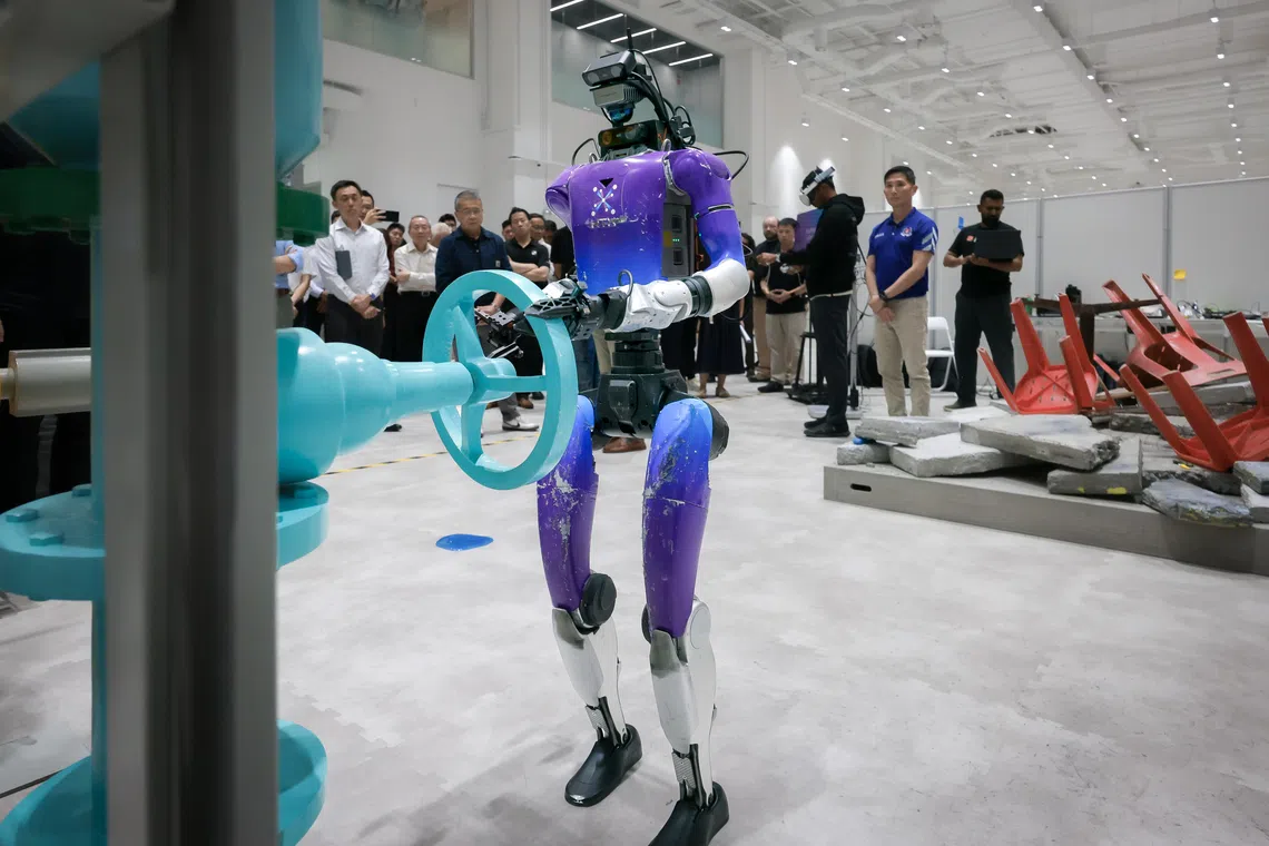 straitstimes.com - David Sun - AI humanoid robots to be deployed with Home Team officers by 2028: Edwin Tong