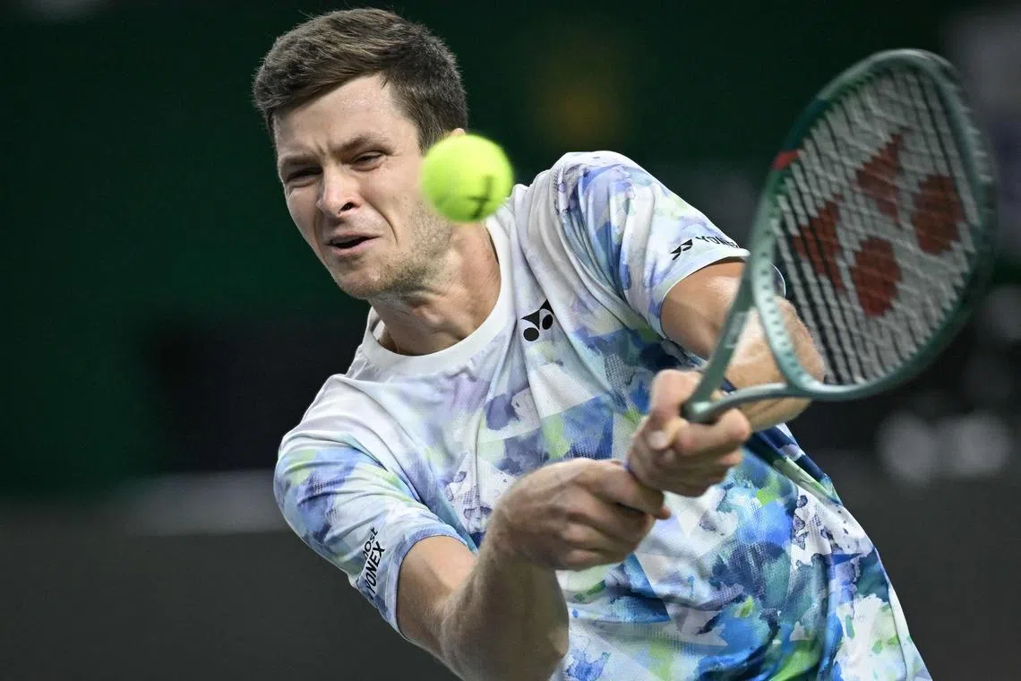 Poland's Hubert Hurkacz hitting a return against the United States' Sebastian Korda during their men's singles semi-final match at the Shanghai Masters tennis tournament in Shanghai on Sunday. Hurkacz won 6-3, 6-4. 