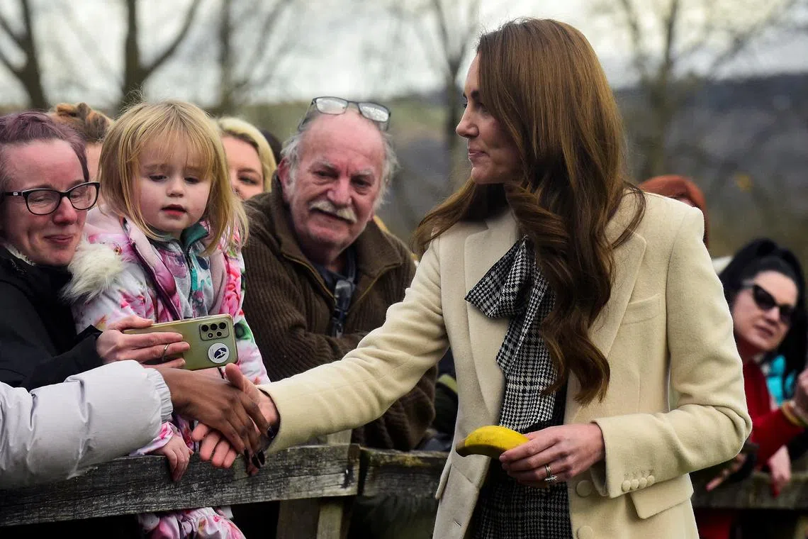 FILE PHOTO: Catherine, Princess of Wales spends time meeting with members of the public during a visit to Corgi, a family run textiles manufacturer focused on the production of socks and knitwear on January 30, 2025 in Ammanford, Wales. Rebecca Naden/Pool via REUTERS/File Photo