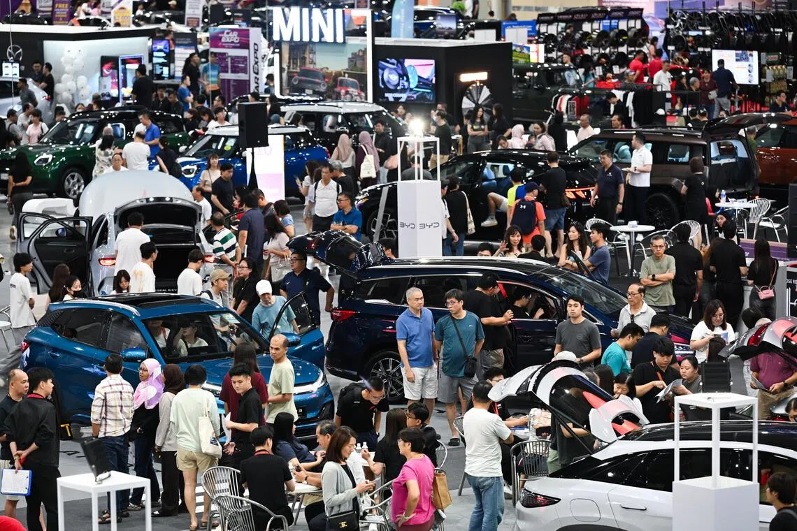 ST20250927-202538400836-Lim Yaohui-pixcarexpo27/
Visitors to the Car Expo 2025 at Singapore Expo, Hall 4 & 5 on Sept 27, 2025.
It runs from 27 – 28 Sept 2025 and is a pit stop for all things automotive. Visitors can explore top car and accessories brands under one roof — from the newest models to the latest in cutting-edge tech.
There are 47 participating brands. 3 Authorised Distributors (AVATR, CUPRA, IM Motors), and 3 Pre-Owned (Auto Selection, MYCAR, Vin’s Automotive Group) exhibitors are joining for the first time.
(ST PHOTO: LIM YAOHUI)