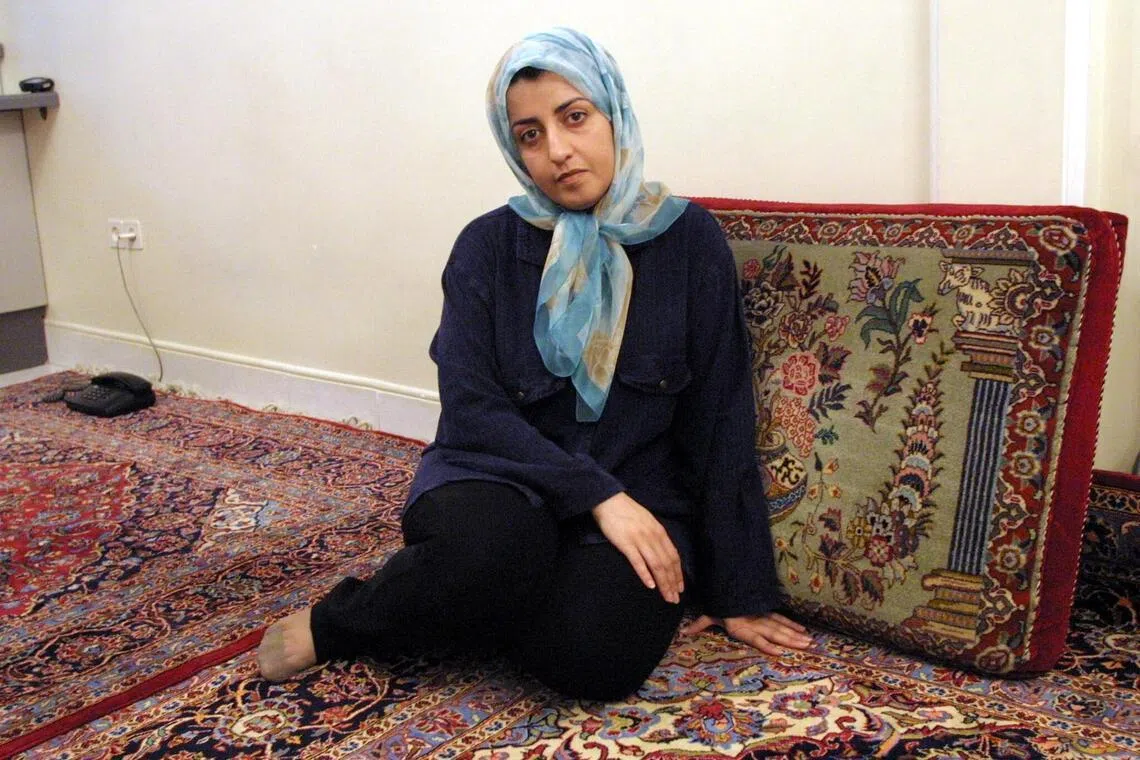 Iranian peace activist Narges Mohammadi at her home in Tehran on September 4, 2001. She is fighting for her life after being hospitalised under guard with a heart condition.