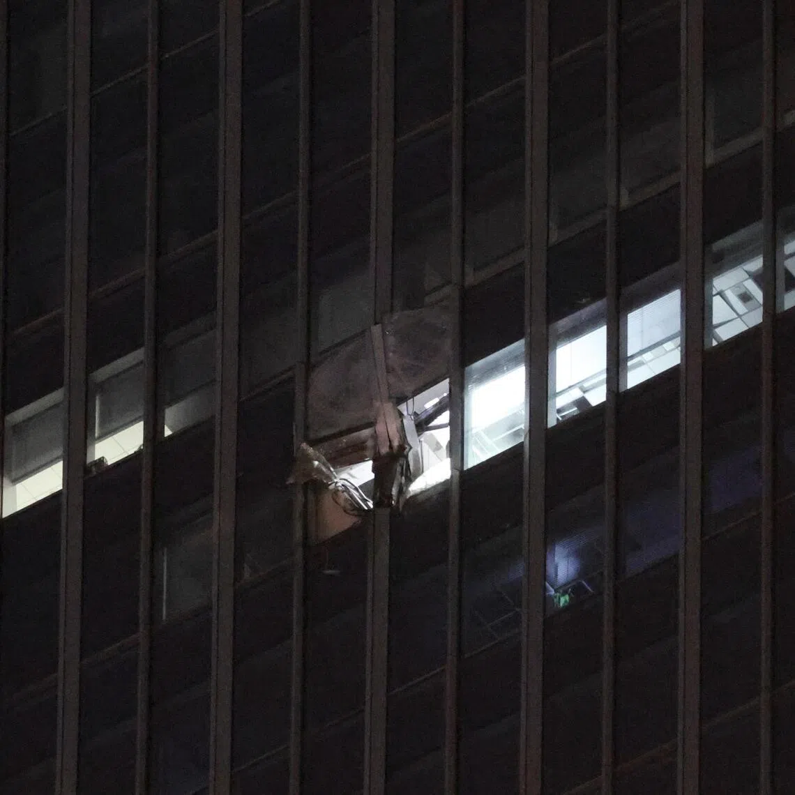 The damaged exterior of CITIC Tower, also known as China Zun, in Beijing, in June.