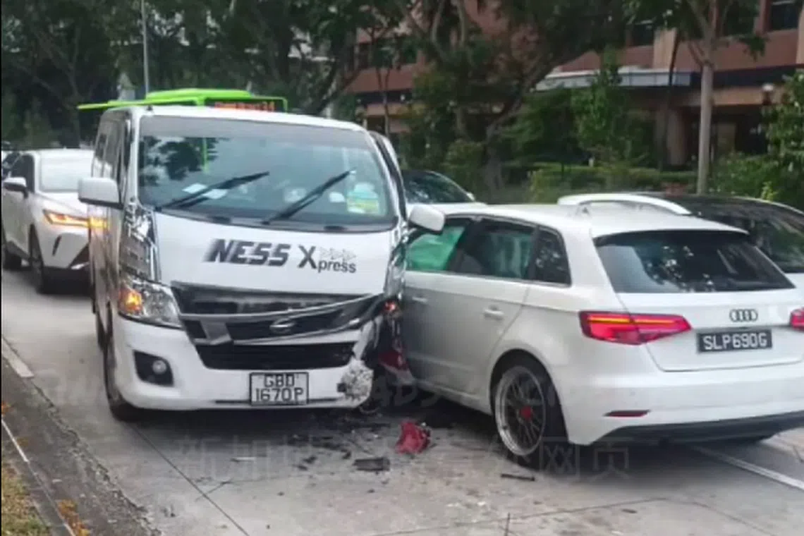 The white car appears to be facing the opposite direction from the direction of traffic flow.