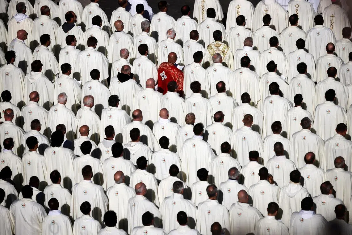 Members of the clergy attend a Mass for the Jubilee of Choirs celebrated by Pope Leo XIV, in Saint Peter's Square, at the Vatican, November 23, 2025. REUTERS/Vincenzo Livieri     TPX IMAGES OF THE DAY     