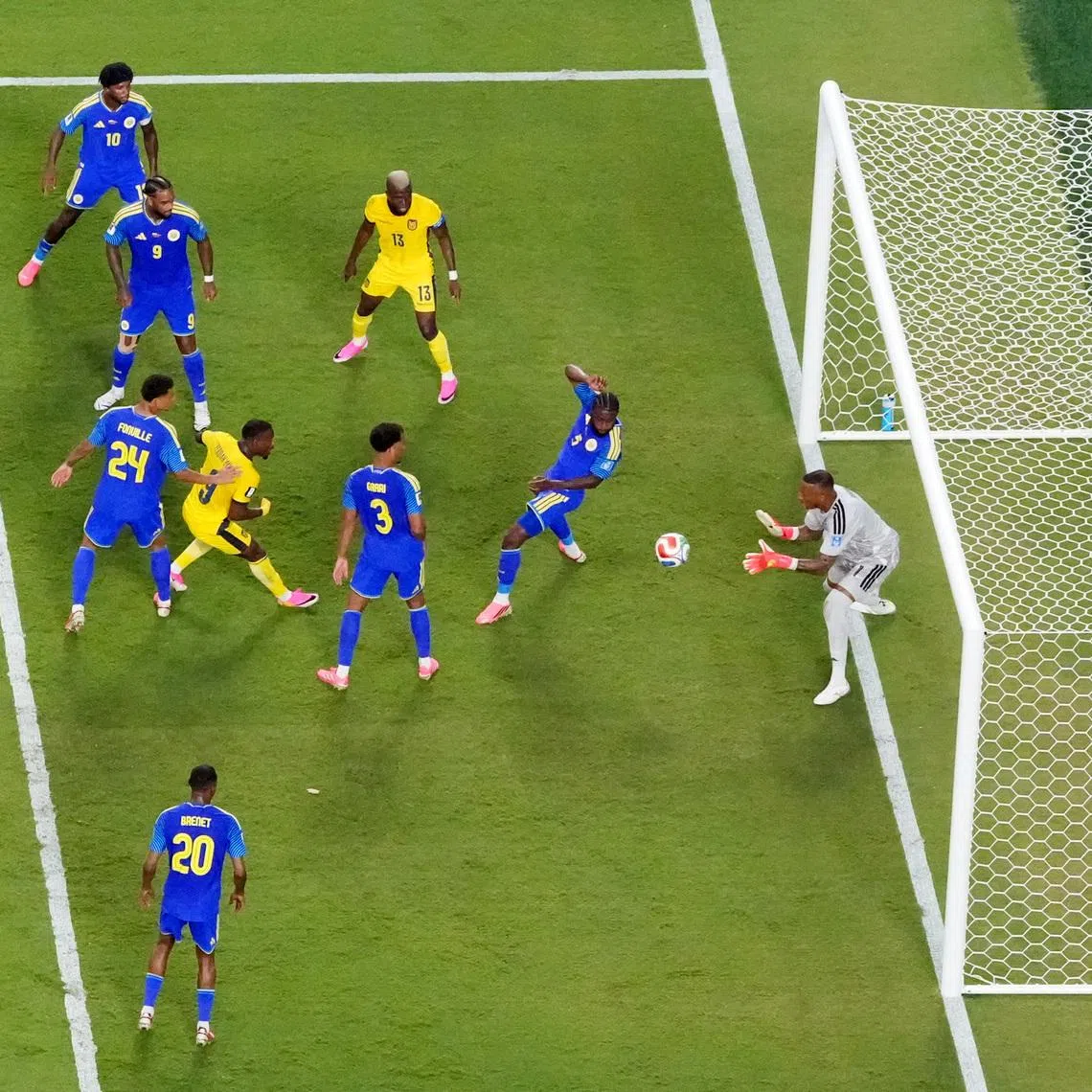 Curacao's Eloy Room in action as he makes a save from Ecuador's Willian Pacho.