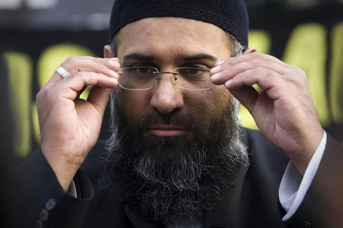 FILE PHOTO: Islamic preacher Anjem Choudary addresses members of the media during a protest supporting the Shari'ah Law, in north London October 31, 2009.      REUTERS/Tal Cohen/Files/File Photo