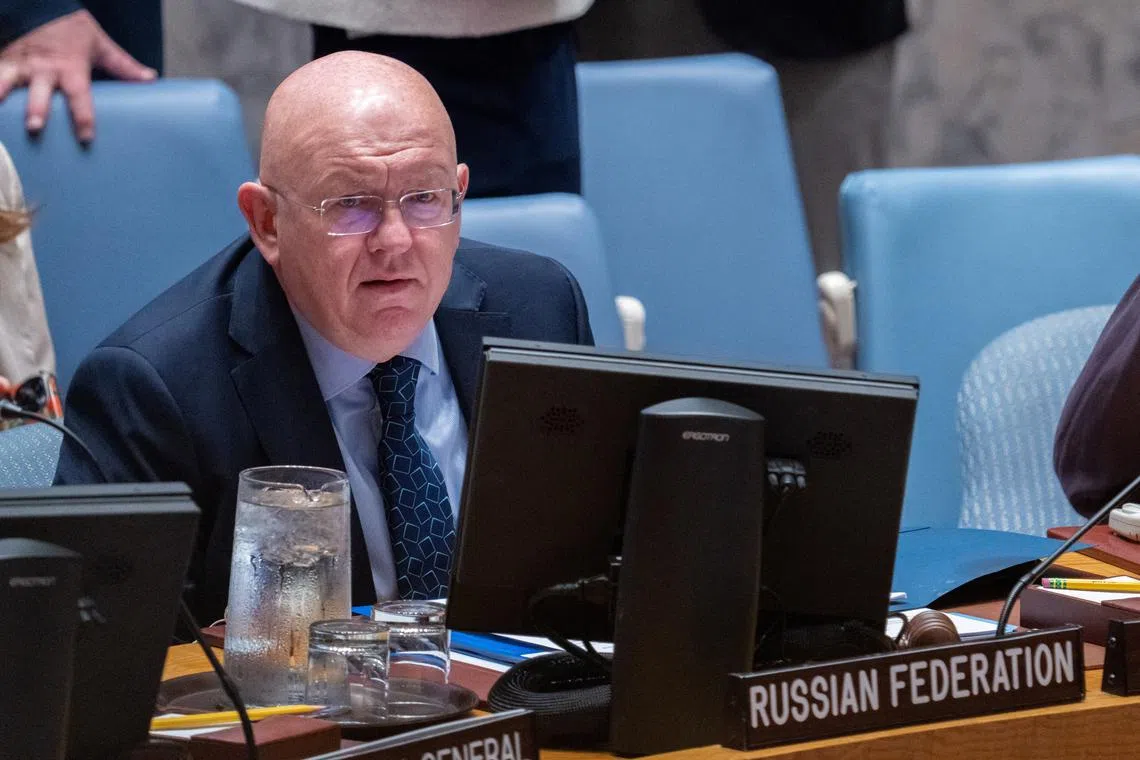 FILE PHOTO: Vassily Nebenzia, Permanent Representative of the Russian Federation and President of the Security Council for the month of July, chairs a meeting of the United Nations Security Council at U.N. headquarters in New York City, U.S., July 25, 2024. REUTERS/David Dee Delgado/File Photo
